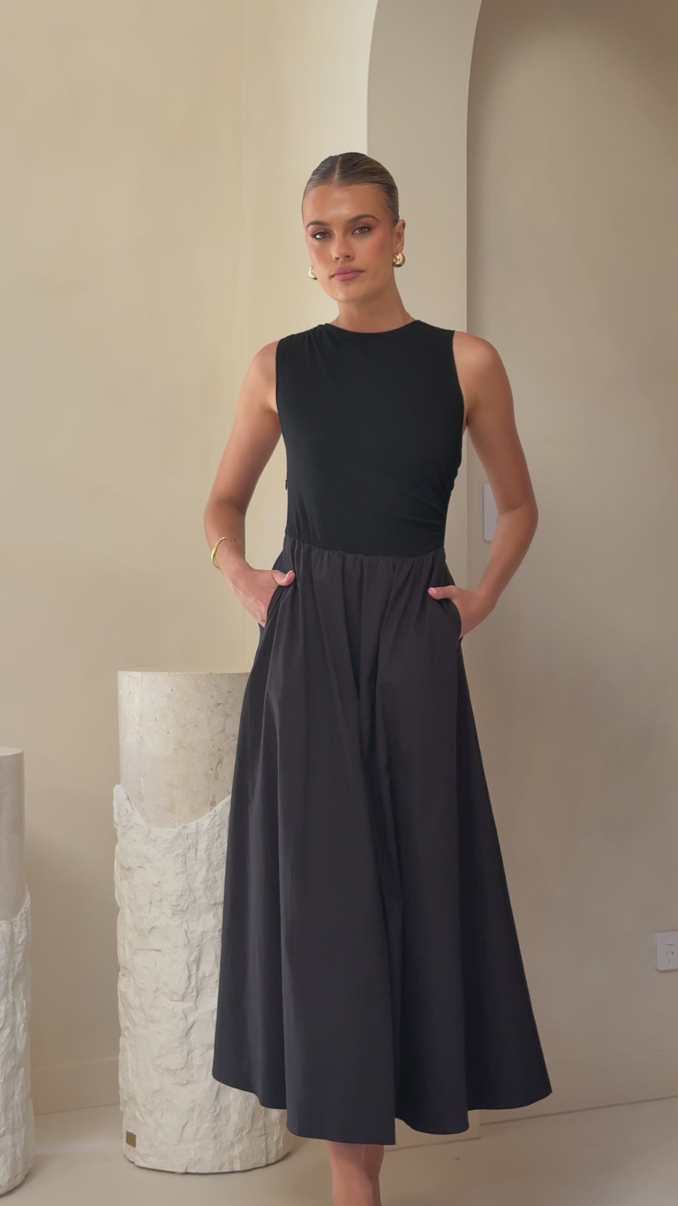 Load video: Aria Sleeveless Midi Dress - Black - Billy J