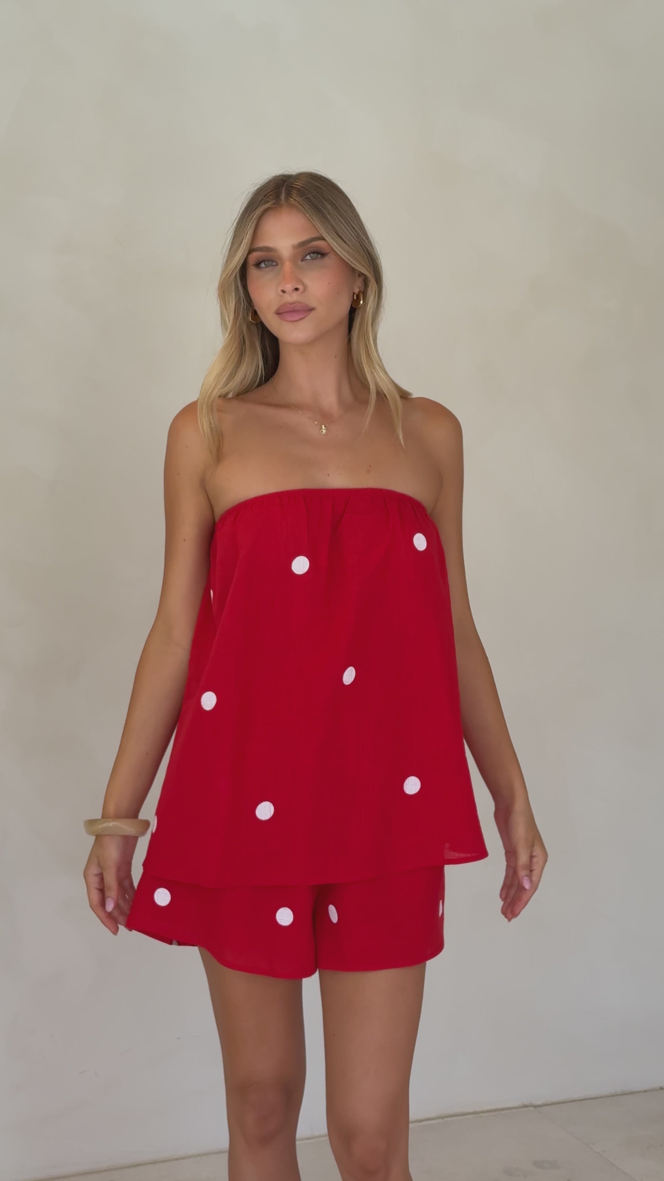 Load video: Calliope Strapless Top and Shorts Set - Red/White Polka Dot - Billy J